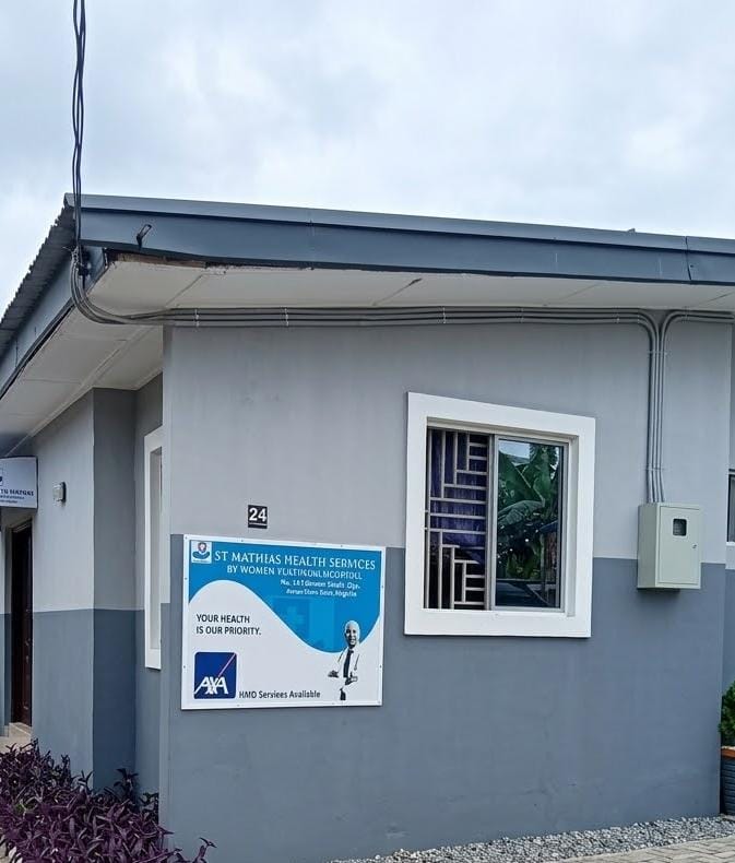 Exterior of St. Mathias Health Services showing number 24 and the hospital sign